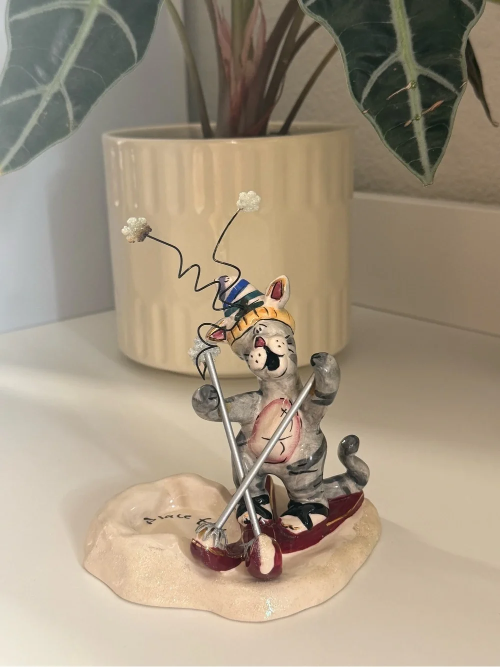 Blue Sky Heather Goldminc Ceramic Cat Skiing Figurine - Cream Base, Red Accents